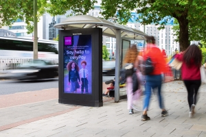 Digital bus shelter poster promoting school open evening in local catchment area UK