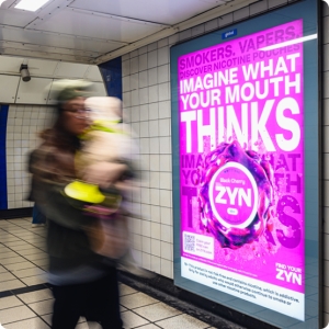 Escalator panel advertising at London Underground station promoting sixth form open evening